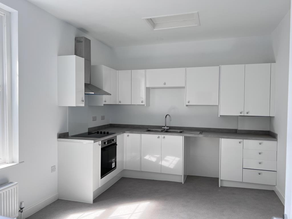 Lot: 145 - THREE-BEDROOM MAISONETTE - Modern white fitted kitchen
